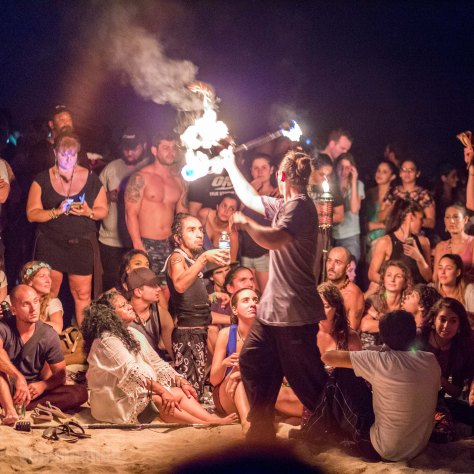 People watching fire dancer._